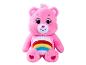 Une peluche Ourson Câlin rose avec un arc-en-ciel sur le ventre.