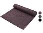 Een paarse yogamat van het merk Fittersport, opgerold.