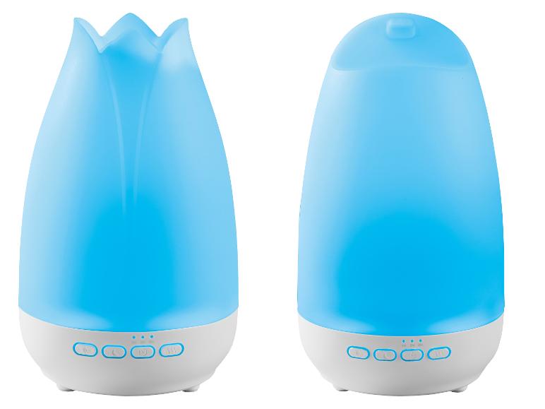 Deux diffuseurs d'arômes bleus, l'un avec un dessus en forme de tulipe et l'autre avec un dessus lisse et arrondi.