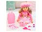 Blonde pop in roze, met koffer en accessoires.