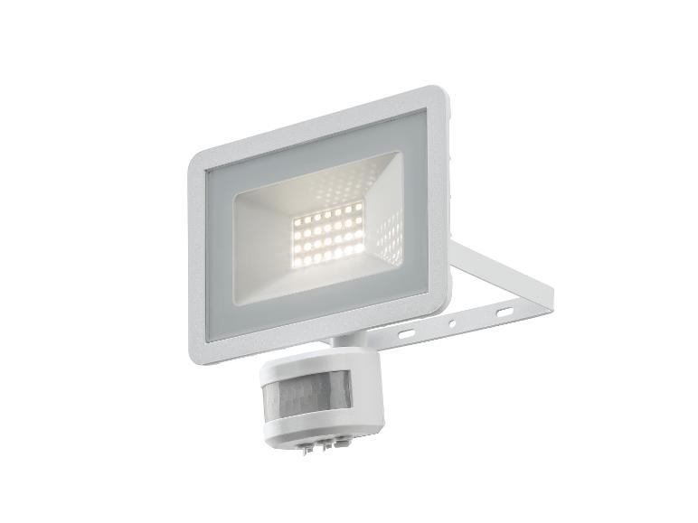 Un luminaire extérieur blanc avec éclairage LED et détecteur de mouvement.