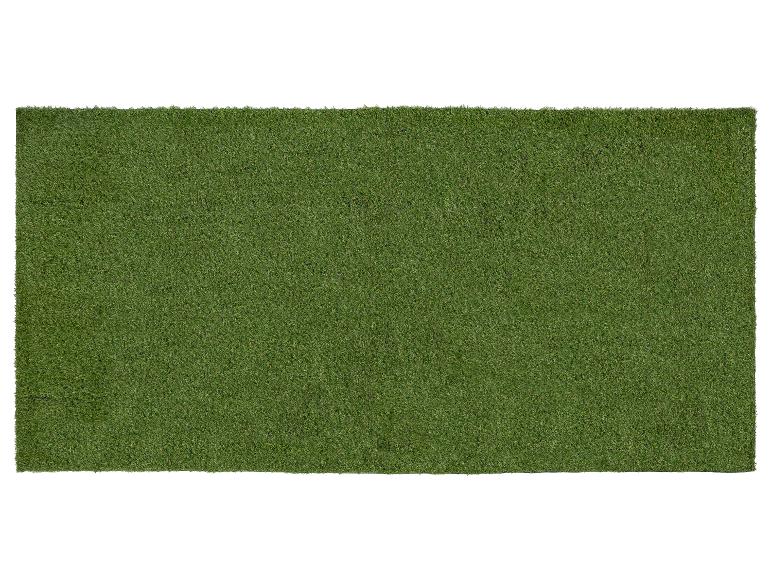 Groen kunstgras tapijt.