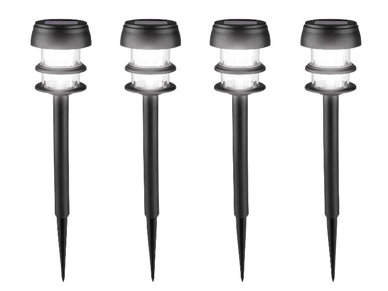 Vier zwarte solar tuinlampen met helder wit licht