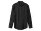 Une chemise noire à manches longues boutonnée avec un col.