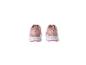 Een paar roze Crivit damessneakers met witte zolen, achteraanzicht.