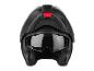 Un casque de moto noir avec une visière et un détail rouge.