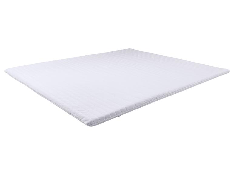 Witte matrasbeschermer met horizontale stiksels