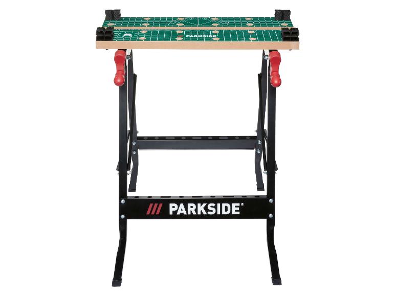 Opvouwbare werkbank met houten blad en groen meetoppervlak, met zwarte poten en rode handgrepen.