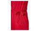 Rode jumpsuit met knopen en riem.