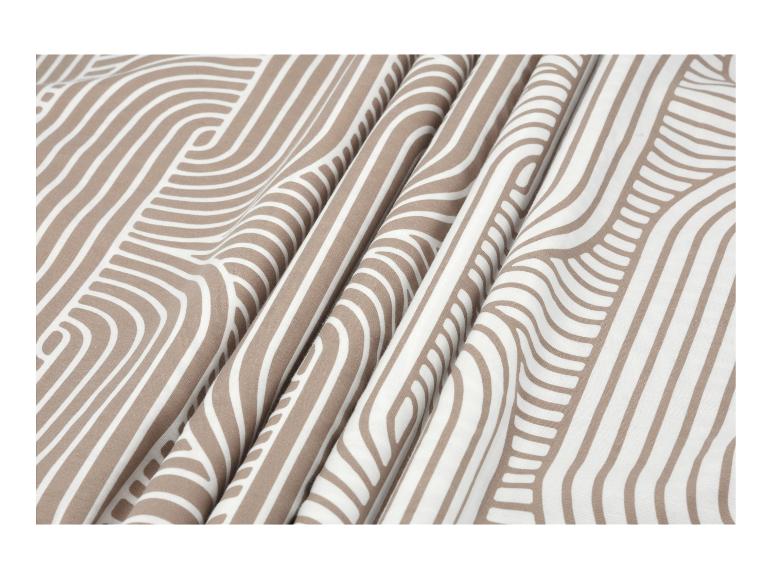 Tissu rayé marron et blanc avec un motif ondulé
