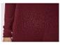 Tissu bordeaux pailleté avec une manche longue et un revers retroussé.