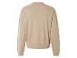 Een beige gebreide trui met lange mouwen.
