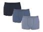 Trois boxers en coton côtelé dans des tons bleus et gris.