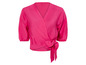 Een roze blouse met een strik