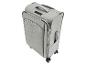 Valise à roulettes gris clair avec poignée télescopique et serrure à combinaison.
