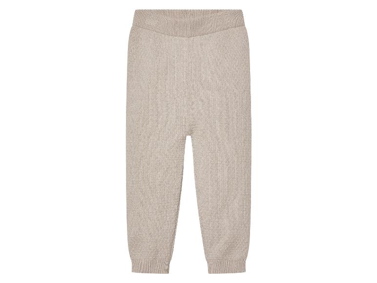 Pantalon en tricot beige avec taille élastique.
