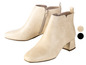 Beige enkellaarsjes met rits.