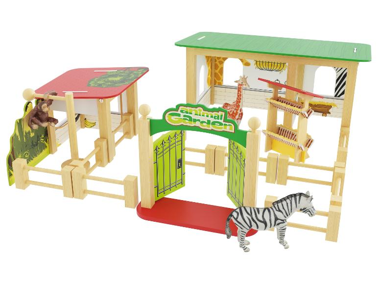 Een houten speelgoeddierentuin met een zebra, giraf en aap.