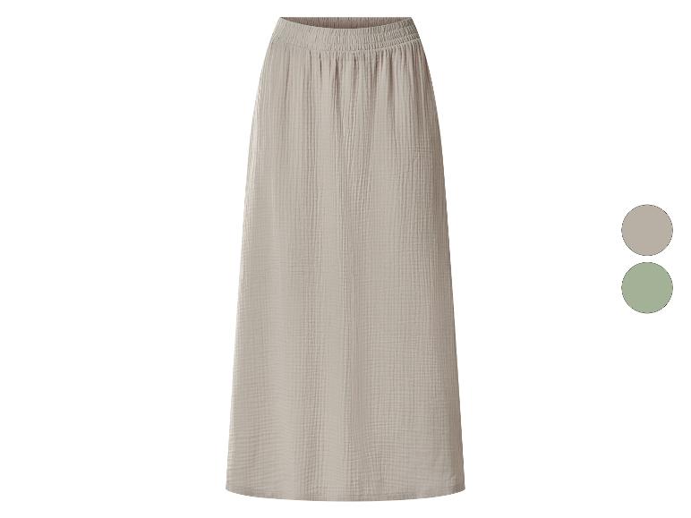 Jupe longue en mousseline avec taille élastique, disponible en beige et vert.