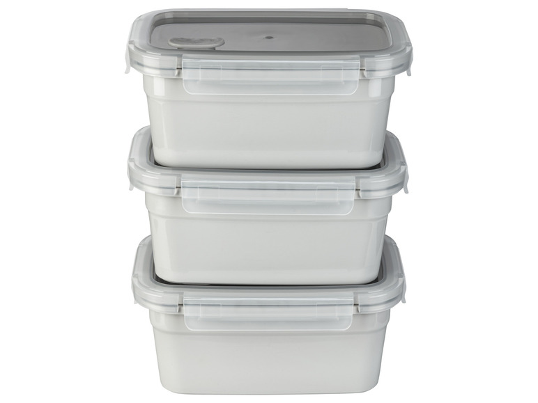 Drie grijze kunststof lunchboxen met deksels