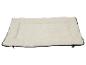 Lit rectangulaire pour animaux de compagnie avec dessus en polaire doux de couleur crème et bordure noire