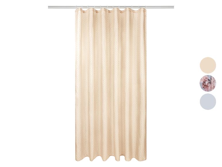 Rideau de douche beige à motif géométrique.