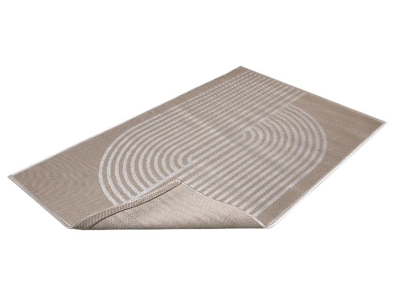 Beige vloerkleed met een wit geometrisch lijnpatroon