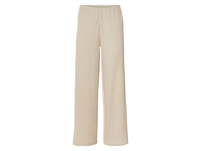 Pantalon beige à jambes larges.