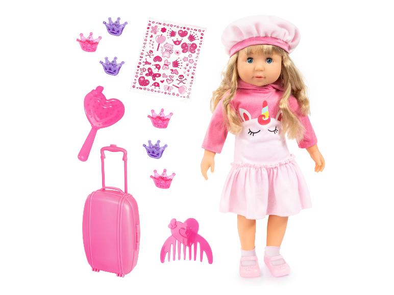 Pop met eenhoornoutfit, roze koffer, kroonclips en stickers.