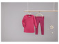 Roze shirt en gestreepte leggings voor meisjes.