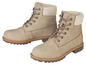 Twee paar beige enkellaarzen met veters.