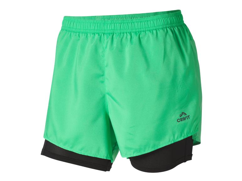 Crivit sportshorts, lichtgroen met zwarte voering.