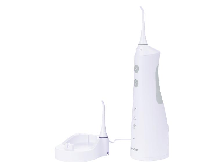Een witte waterflosser van Nevadent met een oplaadstation.