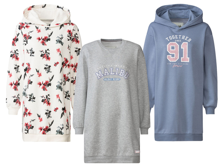 Drie dames hoodies: een met bloemenprint, een met 'Malibu' opschrift en een blauwe met 'Together since 91' print.