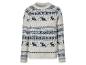 Un pull blanc avec un motif de Noël de rennes et de flocons de neige.