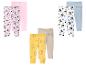 Drie sets kinderleggings: gestippeld, met stripfiguren en effen.