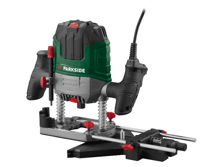 Défonceuse Parkside avec base et accessoires.