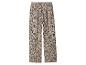 Pantalon beige à imprimé léopard noir et jambes larges.