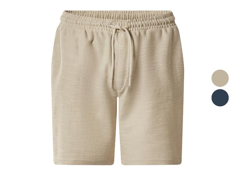 Beige sweatshorts met verstelbaar trekkoord, ook verkrijgbaar in marineblauw.