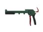 Groen en rood kitpistool op een witte achtergrond