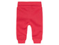Pantalon de jogging rouge pour bébé.