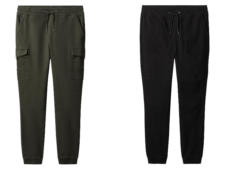 Pantalons cargo verts et noirs avec cordon de serrage et chevilles élastiques.