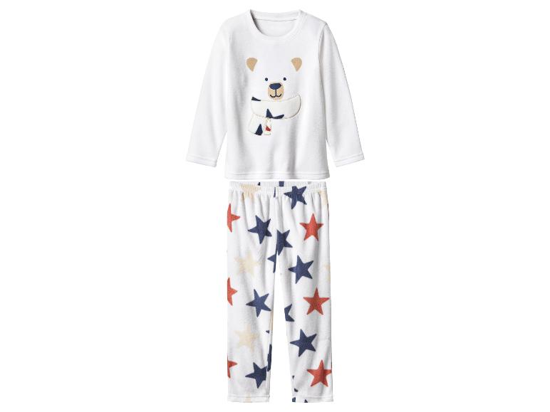 Witte kinderpyjama met ijsbeer en sterrenbroek.