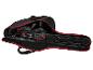 Tronçonneuse Parkside Performance PPEKS 2500 dans un sac de transport noir avec une fermeture éclair rouge.