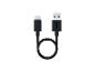 Un court câble USB-C vers USB-A noir, enroulé en boucle.