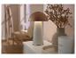 LIVARNO home accu-led-tafellamp op een dressoir.