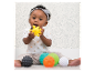 Baby speelt met sensorische ballen en textuur speelgoed.