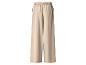 Beige wijde broek met elastische tailleband en zijzakken.