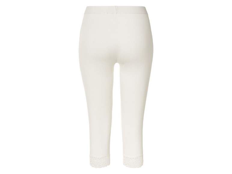 Witte leggings met kant aan de onderkant.