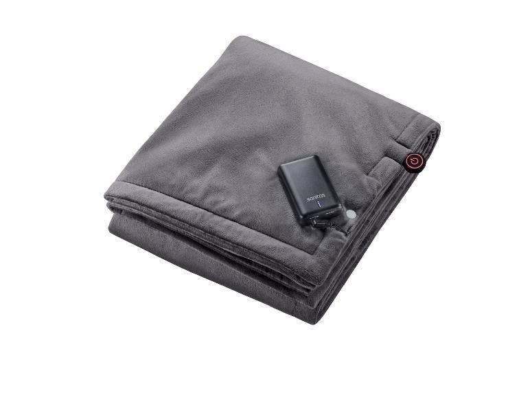 Une couverture Sanitas grise avec une batterie rechargeable